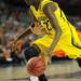 Michigan freshman Caris LeVert moves the ball around a Syracuse defender during the second half at the Final Four in Atlanta on Saturday, April 6, 2013. Melanie Maxwell I AnnArbor.com